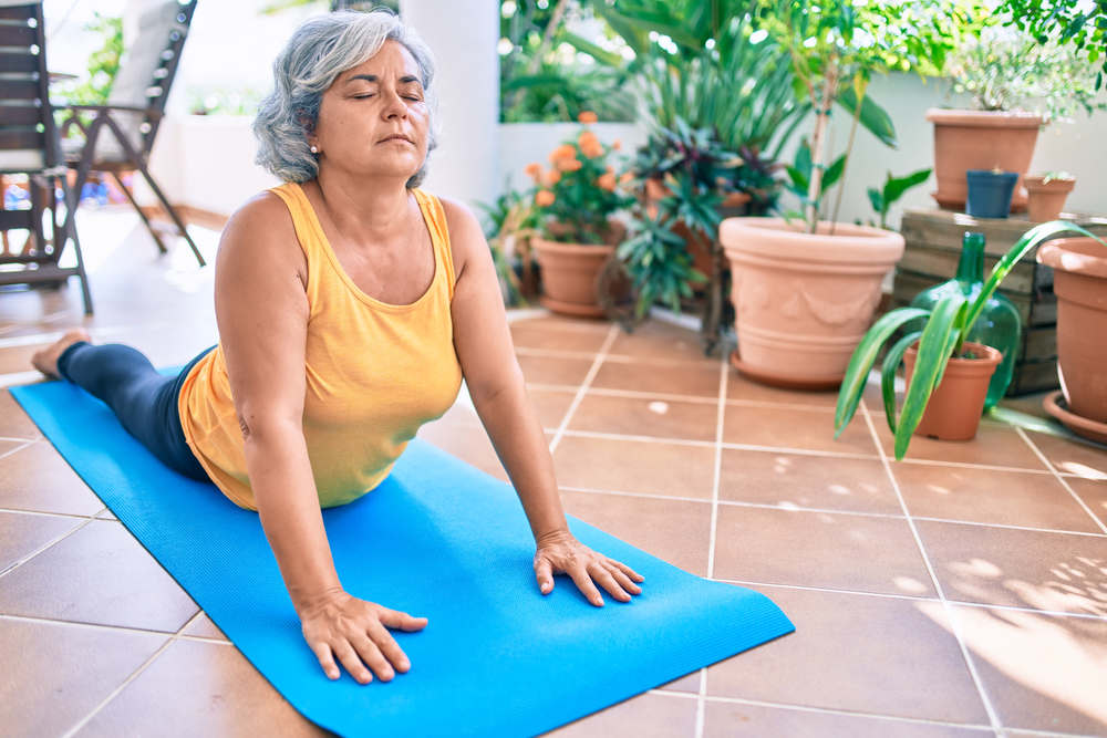 Middle,Age,Woman,With,Grey,Hair,Smiling,Happy,Doing,Exercise