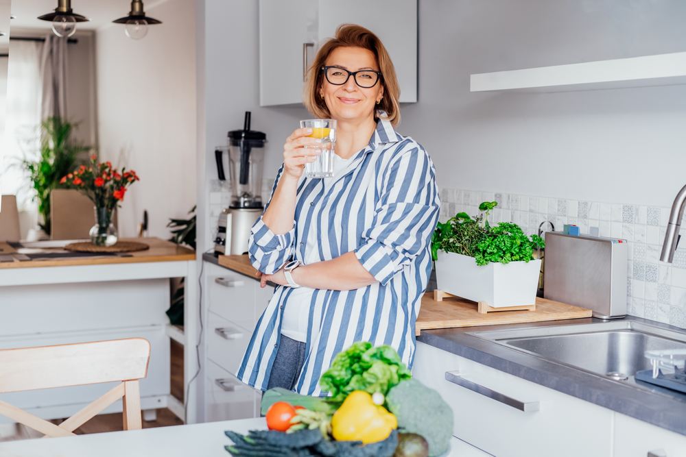 Healthy,Habit,To,Drink,Water.,Smiling,Middle,Age,Woman,With