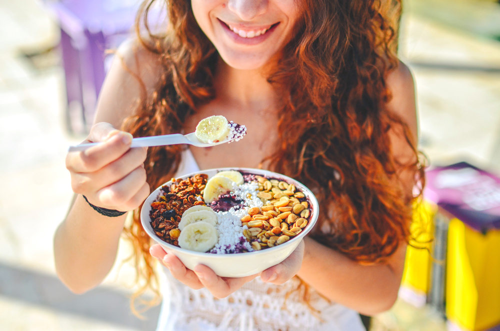 Woman eating healhty - Eating for Energy Foods That Boost Your Vitality